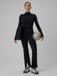 4F Spodnie treningowe z rozszerzanymi nogawkami damskie - czarne L. Czarne spodnie dresowe damskie 4F, bez wzorów, ze skóry, z podwyższonym stanem, długie, na fitness i siłownię. Za 169.99 zł.