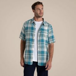 Koszula Craghoppers Argino. Niebieskie koszule męskie Craghoppers, m, bez wzorów, casualowe, bez kołnierzyka, bez ramiączek. Za 247.75 zł.