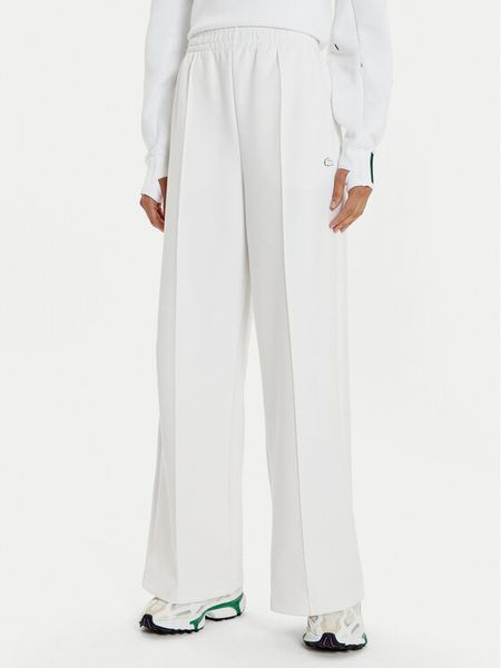 Lacoste Spodnie dresowe XF7374 Biały Wide Leg. Białe spodnie dresowe damskie Lacoste, bez wzorów, z bawełny. Za 589.99 zł.