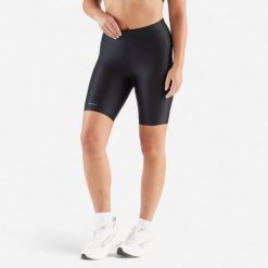 Legginsy do biegania krótkie damskie Kiprun Run 100 Comfort. Czarne legginsy damskie KALENJI, bez wzorów, z elastanu. Za 39.99 zł.