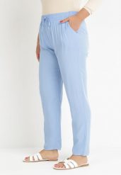Niebieskie Materiałowe Spodnie z Gumką w Talii Airiana. Niebieskie spodnie materiałowe damskie Born2be, bez wzorów, z jeansu, eleganckie, plus size. Za 14.99 zł.