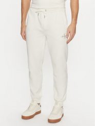 Calvin Klein Jeans Spodnie dresowe Monologo Hwk Pant J30J325658 Écru Regular Fit. Spodnie sportowe męskie Calvin Klein Jeans, m, bez wzorów, z dresówki. Za 239.99 zł.