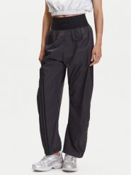 Adidas Spodnie dresowe JJ0920 Szary Loose Fit. Szare spodnie dresowe damskie Adidas, bez wzorów, z dresówki. Za 269.99 zł.