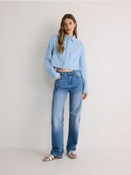 Muślinowa koszula - jasnoniebieski. Niebieskie koszule damskie Reserved, l, bez wzorów, z bawełny, bez kołnierzyka, bez ramiączek. W wyprzedaży za 35.99 zł.