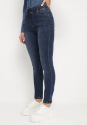 Granatowe Jeansy Slim z Gumką w Talii i Sznurkiem z Bawełną Ilisora. Niebieskie jeansy damskie Born2be, bez wzorów, z bawełny, eleganckie, z podwyższonym stanem. Za 24.99 zł.