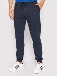 Guess Spodnie dresowe Z2YB22 KAIJ1 Granatowy Regular Fit. Niebieskie spodnie sportowe męskie Guess, m, z aplikacjami, z bawełny. Za 279.99 zł.