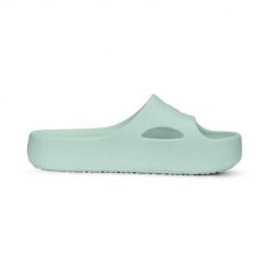 Klapki damskie Puma Shibusa. Zielone klapki damskie Puma, bez wzorów, z materiału, sportowe, bez obcasa, bez zapięcia. Za 189.00 zł.