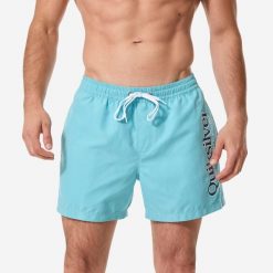Spodenki surfingowe męskie Quiksilver Til Aqua krótkie 15". Niebieskie szorty męskie Quiksilver, bez wzorów, z poliesteru, sportowe. Za 179.99 zł.
