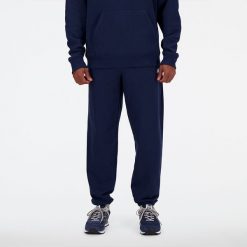 Spodnie męskie New Balance MP41519NNY – granatowe. Niebieskie spodnie sportowe męskie New Balance, m, bez wzorów, z bawełny. Za 249.99 zł.