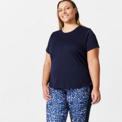 Koszulka fitness damska Domyos Plus Size krótki rękaw. Czarne bluzki damskie DOMYOS, l, bez wzorów, z elastanu, sportowe, bez kołnierzyka, plus size, bez ramiączek. Za 39.99 zł.