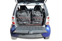 Torby Do Bagażnika Smart Fortwo Coupe 1998-2007 2Szt Kjust. Czarne torby podróżne damskie KJUST, bez wzorów, z kauczuku. Za 503.00 zł.