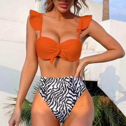 Strój kąpielowy z wysokim stanem modelujący brzuch plażowy Lidwina. Stroje kąpielowe damskie Intica, s, bez wzorów, z materiału. Za 129.00 zł.