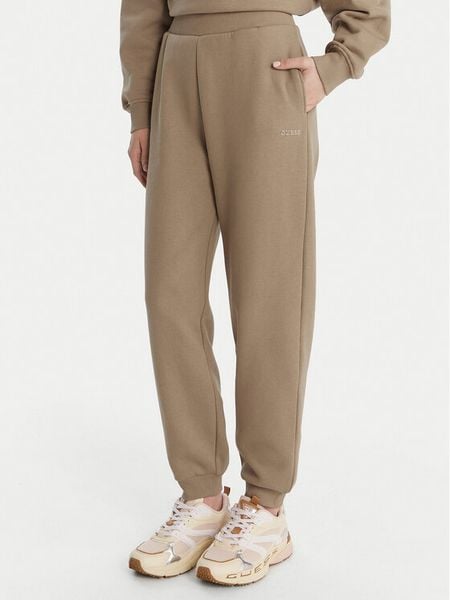 Guess Spodnie dresowe V6RB15 K9V31 Beżowy Regular Fit. Brązowe spodnie dresowe damskie Guess, z aplikacjami, z bawełny. Za 299.99 zł.