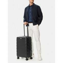 Walizka średnia GINO ROSSI. Czarne walizki damskie Gino Rossi, bez wzorów, średnie. Za 279.99 zł.
