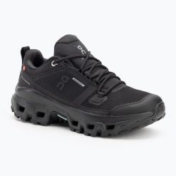 Buty damskie On Cloudrock Low Waterproof. Czarne obuwie trekkingowe damskie On, z materiału, bez zapięcia. Za 805.45 zł.
