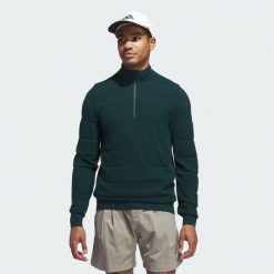 Sweter Ultimate365 Tour Wind Knit Quarter-Zip. Zielone swetry męskie Adidas, m, bez wzorów, sportowe, bez kołnierzyka, bez ramiączek. W wyprzedaży za 519.35 zł.