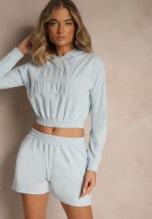 Jasnoniebieski Komplet z Bawełny w Sportowym Stylu Bluza z Kapturem i Szorty Izurea. Niebieskie bluzy damskie Renee, na lato, bez wzorów, z bawełny, klasyczne, bez ramiączek, z kapturem. Za 89.99 zł.