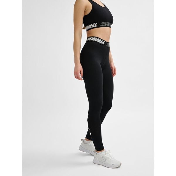 Damskie bawełniane legginsy o średnim kroju Hummel TE Maja. Czarne legginsy damskie Hummel, bez wzorów, z bawełny. Za 129.50 zł.