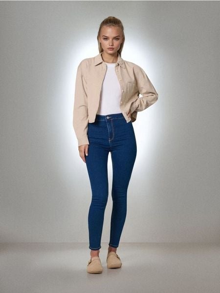 Jeansy skinny high waist - granatowy. Niebieskie jeansy damskie Sinsay, bez wzorów, z denimu, z podwyższonym stanem. Za 35.99 zł.