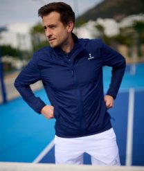 Męska Tennis/Padel Kurtka wiatrówka. Niebieskie kurtki męskie NORDICDOTS, m, bez wzorów, z materiału, eleganckie, bez kaptura. Za 405.00 zł.