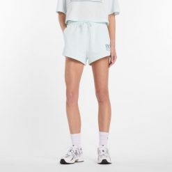 Spodenki damskie New Balance WB61Y80AAAW – miętowe. Zielone szorty damskie New Balance, bez wzorów, z bawełny, klasyczne. Za 199.99 zł.