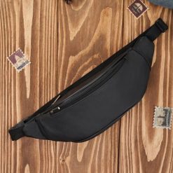 Saszetka nerka męska skórzana na pas czarna skóra naturalna Abruzzo ABR-51. Czarne saszetki i nerki męskie z aplikacjami, z materiału, zdobione. Za 84.00 zł.