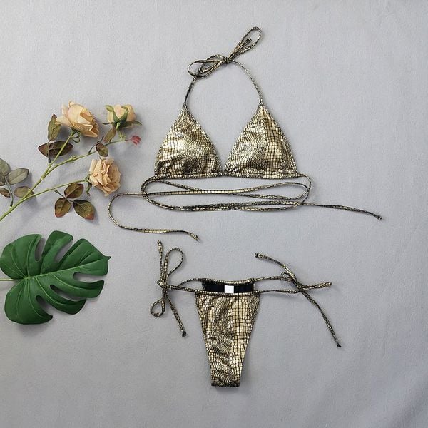 Bikini z wzorem zwierzęcym odporne na chlor i słoną wodę Lenke. Żółte bikini Intica, bez wzorów, z materiału. Za 139.00 zł.