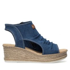 Sandały Rieker. Niebieskie sandały damskie Rieker, bez wzorów, bez obcasa, na koturnie, bez zapięcia. Za 329.99 zł.