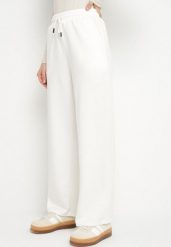 Białe Spodnie Dresowe Szerokie z Wiskozą Elaniris. Białe spodnie dresowe damskie Born2be, bez wzorów, z dresówki, eleganckie. Za 34.99 zł.
