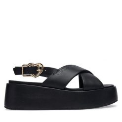 Sandały LOVE MOSCHINO. Czarne sandały damskie Love Moschino, bez wzorów, bez obcasa, na koturnie, bez zapięcia. Za 929.99 zł.