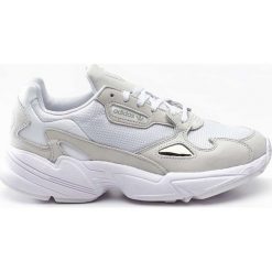 Sneakersy skórzane białe Adidas Falcon W B28128 - biały. Białe obuwie sportowe damskie Adidas, bez wzorów, bez zapięcia. Za 399.99 zł.