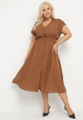 Brązowa Lniana Sukienka o Rozkloszowanym Kroju z Gumką w Talii Ageronna. Brązowe sukienki damskie Born2be, na spotkanie biznesowe, na lato, l, bez wzorów, eleganckie, bez kołnierzyka, bez ramiączek, midi, rozkloszowane. Za 139.99 zł.