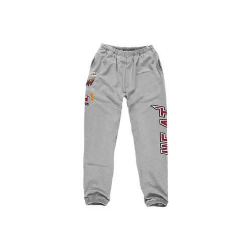 Spodnie sportowe męskie Mitchell & Ness Champ City Fleece Miami Heat. Szare spodnie sportowe męskie Mitchell & Ness, m, bez wzorów, z dresówki. Za 602.00 zł.