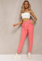 Różowe Dresowe Spodnie High Waist z Błyszczącym Sznurkiem w Pasie Darciasa. Czerwone spodnie dresowe damskie Renee, bez wzorów, z dresówki, z podwyższonym stanem. Za 59.99 zł.