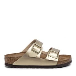 Klapki Birkenstock. Żółte klapki damskie Birkenstock, bez wzorów, bez obcasa, bez zapięcia. Za 399.99 zł.