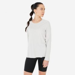 Koszulka turystyczna damska z długim rękawem Quechua MH500. Brązowe bluzki damskie QUECHUA, m, bez wzorów, z materiału, sportowe, bez kołnierzyka, bez ramiączek. Za 79.99 zł.