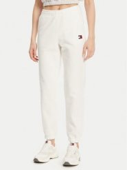 Tommy Jeans Spodnie dresowe Badge DW0DW20679 Écru Regular Fit. Spodnie dresowe damskie Tommy Jeans, bez wzorów, z bawełny. Za 219.99 zł.