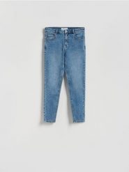 Jeansy slim fit mid rise - niebieski. Niebieskie jeansy damskie Reserved, bez wzorów, z bawełny. Za 99.99 zł.
