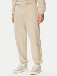 HUGO Spodnie dresowe Dalipant 50563100 Beżowy Relaxed Fit. Brązowe spodnie sportowe męskie Hugo, m, bez wzorów, z bawełny. Za 599.99 zł.
