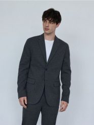 Marynarka slim fit - ciemnoszary. Szare garnitury męskie Reserved, bez wzorów, z bawełny. W wyprzedaży za 199.99 zł.