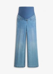 Szerokie jeansy ciążowe z elastycznego denimu, pełna długość. Niebieskie jeansy damskie bonprix, bez wzorów, z denimu, moda ciążowa. Za 179.99 zł.