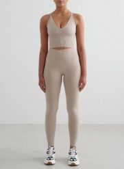 Damskie legginsy invisible scrunch, squat proof Shape Seamless beżowy melanż. Brązowe legginsy damskie Aim'n, bez wzorów, z dzianiny. Za 297.00 zł.