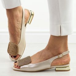 Złote sandały damskie na obcasie Potocki 43314. Żółte sandały damskie POTOCKI, z aplikacjami, ze skóry, bez obcasa, na obcasie, bez zapięcia. Za 169.00 zł.