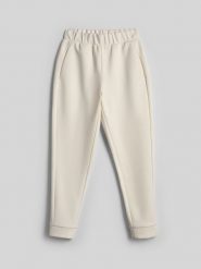 4F Spodnie dresowe joggery damskie - kremowe XXL. Białe spodnie dresowe damskie 4F, bez wzorów, z dresówki, klasyczne. Za 149.99 zł.