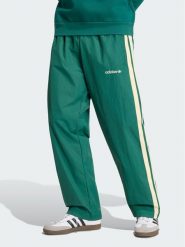Adidas Spodnie dresowe Cutline Track KW8022 Zielony Regular Fit. Zielone komplety dresowe męskie Adidas, m, bez wzorów, z dresówki. Za 328.99 zł.