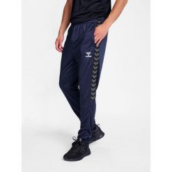 Spodnie dresowe treningowe Hummel Authentic. Niebieskie spodnie dresowe damskie Hummel, bez wzorów, z dresówki, sportowe. Za 193.50 zł.
