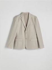 Marynarka slim fit - beżowy. Brązowe garnitury męskie Reserved, l, bez wzorów, z dzianiny. W wyprzedaży za 159.99 zł.