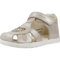 Sandały GEOX B SANDAL MACCHIA Złoty. Żółte sandały damskie Geox, bez wzorów, ze skóry, bez obcasa, bez zapięcia. Za 234.99 zł.