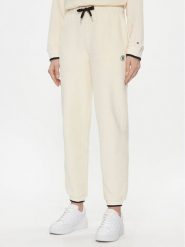 Tommy Hilfiger Spodnie dresowe WW0WW40602 Écru Regular Fit. Spodnie dresowe damskie Tommy Hilfiger, bez wzorów, z bawełny. Za 599.99 zł.