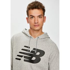 New Balance - Bluza. Szare bluzy męskie New Balance, l, bez wzorów, z bawełny, bez ramiączek, z kapturem. W wyprzedaży za 179.90 zł.